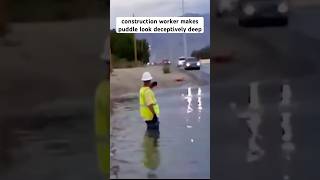 Construction worker makes puddle look deceptively deep [upl. by Eitnom]