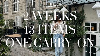 Packing Light Minimal Travel Capsule for Two Weeks in a Carryon Only [upl. by Calan]