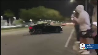 VIDEO Mustang runs into crowd at Sarasota Lamborghini dealership [upl. by Mosby]