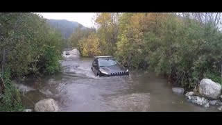 Jeep Cherokee Trailhawk Fording DEEP Water  3 FEET WININING  Obstacles [upl. by Areehs]