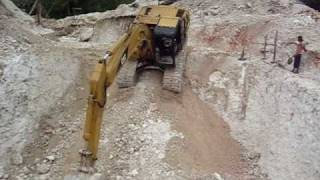 Excavator climbing out of deep hole [upl. by Esilec]