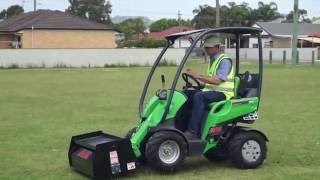 Avant 225 mini loader with Avant Lawn Aerator Attachment [upl. by Nennerb]