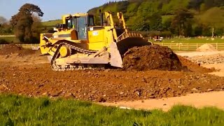 CAT D8 dozer at work pushing gravel for road construction [upl. by Ataliah]