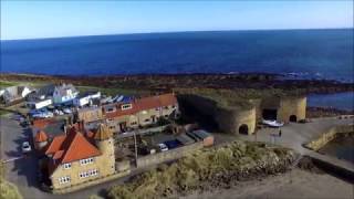 Aerial footage of Beadnell Bay and Seahouses [upl. by Reinwald476]