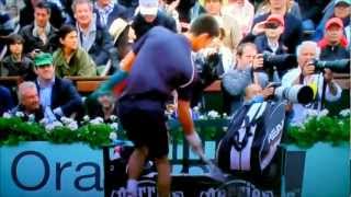 Novak Djokovic smashes Perrier sign at 2012 French Open [upl. by Akimot773]