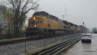 Northbound UP intermodal in a downpour 111724 [upl. by Emelin]