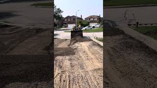 Grading a driveway with skid steer [upl. by Nerag]