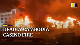 Massive fire engulfs Cambodian casino people jump out of windows to escape [upl. by Annelg]