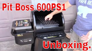 Pit Boss 600PS1 Unboxing and assembly Smoker grill [upl. by Anikehs]