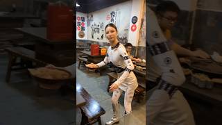 A Robotic Waiter Serves Food at a Chongqing Hotpot Restaurant in China robotserver [upl. by Atteynek]