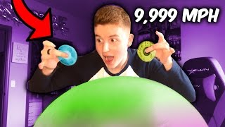 9999 MPH FIDGET SPINNER VS GIANT WUBBLE BUBBLE BALL [upl. by Eegnat]