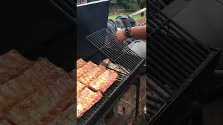 Indirect Grilling Baby Back Ribs on the CharGriller 2137 Outlaw Charcoal Grill with Hickory Chunks [upl. by Aihceyt688]