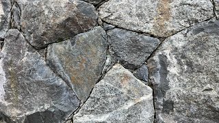 Secrets to creating a beautiful NATURAL STONE WALL Insights from a real stonemason [upl. by Siramay92]