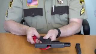 Gun lock demonstration  handgun [upl. by Enneirda522]