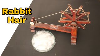 Making thread from Rabbit Fur Spinning Wheel [upl. by Tyler576]