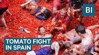 Hundreds Of Tons Of Tomatoes Are Used As Ammo In Spains Tomatina Festival [upl. by Craig417]