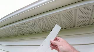 Installing security cameras under eave with vinyl soffit [upl. by Cerell18]