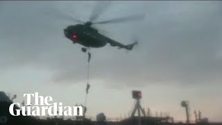 Iran troops rappel onto seized Britishflagged oil tanker [upl. by Llerrej]