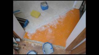 Ceramic Tile Kitchen Floor installed on quotSchluter Ditraquot [upl. by Enotna]