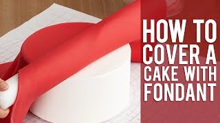 How to Cover a Round Cake with Fondant [upl. by Arabel]