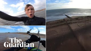 Kitesurfer makes staggering 200metre leap over sand spit in Devon [upl. by Pegeen]