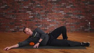 GRID Ball How to Foam Roll Your Lats with a Massage Ball [upl. by Juetta]