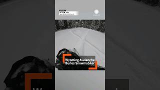 Dramatic Video Snowmobiler Trapped in Wyoming Avalanche [upl. by Cherilyn]