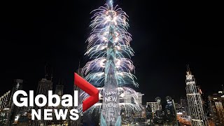 New Years 2022 Dubai puts on dazzling fireworks laser show at Burj Khalifa [upl. by Haskel724]