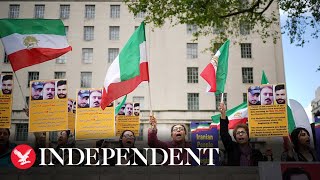 Demonstrators gather outside Downing Street to protest against Iran executions [upl. by Ibmat]