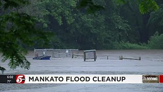 Mankato residents dump debris from flooddamaged basements City prepares for more rain [upl. by Prober72]