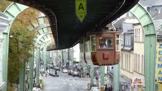 The historic Kaiserwagen of the Wuppertal Suspension Railway is leaving the station Vohwinkel [upl. by Tomkins]