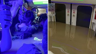 Passengers trapped in flooded subway in China [upl. by Bunker441]