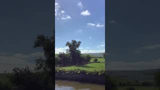 Narrowboat Snails Pace passing us on Di amigo on the Leeds and Liverpool canal outside Skipton [upl. by Anitnatsnoc]