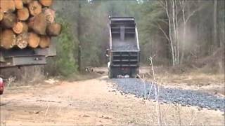 Volvo Dump Truck Spreading Slag Rock [upl. by Atteinotna618]