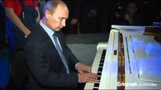 Vladimir Putin plays piano in singalong at Moscow theatre [upl. by Ury333]