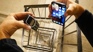 Dropping an iPhone 13 Pro vs Nokia 3310 Down Spiral Staircase 20 Stories  Will it Survive [upl. by Inal552]