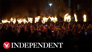 Thousands of torches light Edinburgh streets kicking off Hogmanay celebrations [upl. by Anonyw]