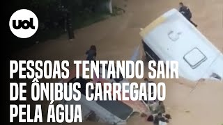 Petrópolis vídeo mostra pessoas tentando sair de ônibus carregado pela água [upl. by Higgs467]