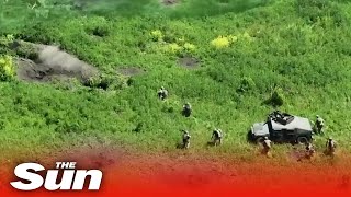 Incredible video shows Ukrainian soldiers in Humvees storming Russian trenches [upl. by Dulcine]