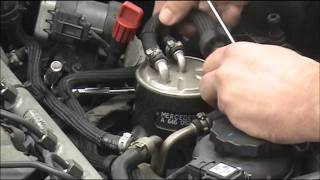 Fitting and bleeding a Mercedes diesel fuel filter [upl. by Htidirem910]