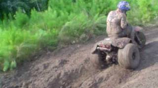 mudding a honda three wheeler 1984 200s 2 [upl. by Hadihahs]