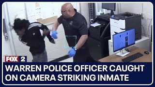 Warren police officer caught on camera striking inmate slamming him to ground [upl. by Atiseret]