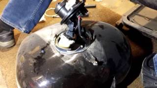 How to change fuel filter in a fuel injected Harley Davidson FLHCPI [upl. by Nashner103]