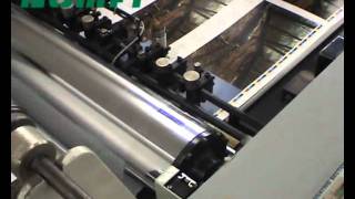 Komfi Delta thermal laminating machine [upl. by Wehtam213]