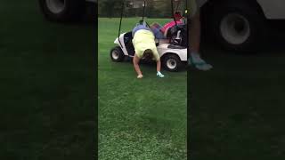 Golfer Falls Out Of Golf Cart Trying To Pick Up Ball Hilarious Fail Video golf [upl. by Yrebmik]