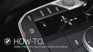 How to use the Auto Hold function in your BMW – BMW HowTo [upl. by Icats]