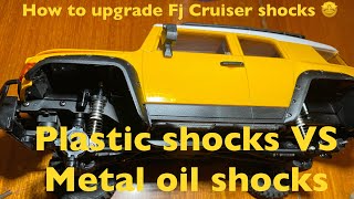 FMS Fj Cruiser Shock replacement   Plastic shocks Vs Metal oil shocks [upl. by Auqinu]