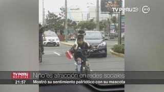 Niño que pasea en bicicleta junto a su perra es la sensación de las redes sociales [upl. by Adnohsat]