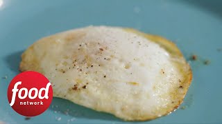 How to Fry Eggs Like a Pro  Food Network [upl. by Cowey]