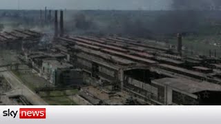 Ukraine War Helicopter footage shows Mariupols smoky ruins [upl. by Brigham]